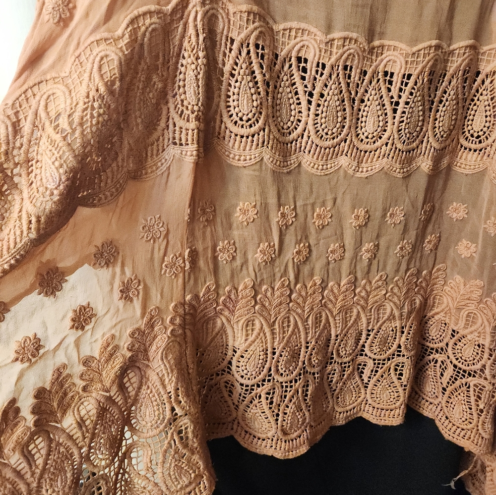 Silk sleeveless long vest/cover. Tan in color